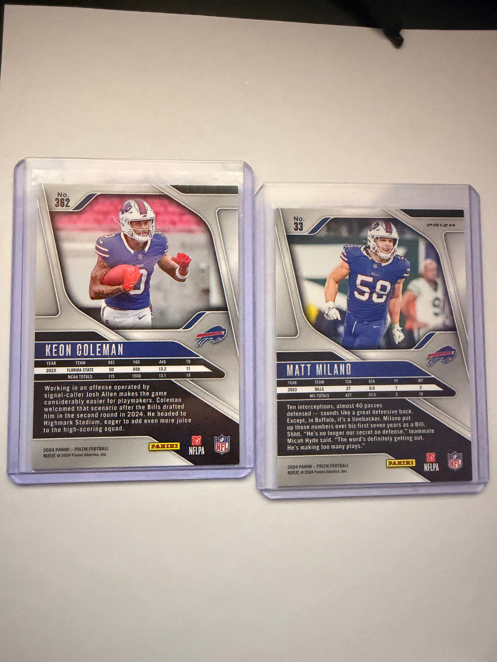 2024 Panini Prizm Keon Coleman RC Base + Matt Milano Checkerboard Parallel – Buffalo Bills lot. Rookie card plus short-print checkerboard veteran.