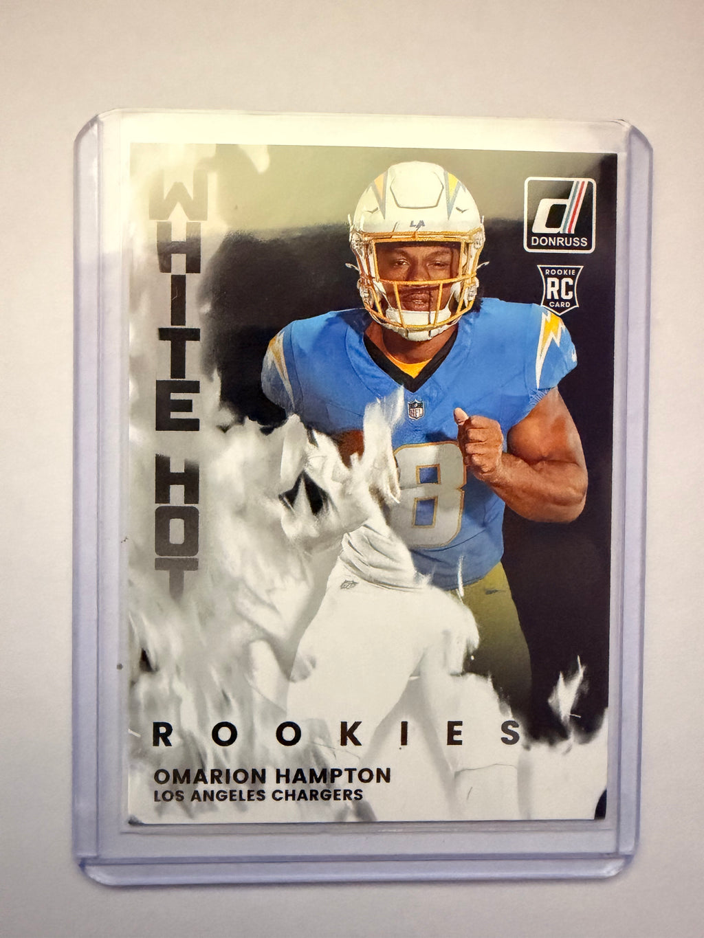 Donruss White Hot Rookies Omarion Hampton – Los Angeles Chargers insert.