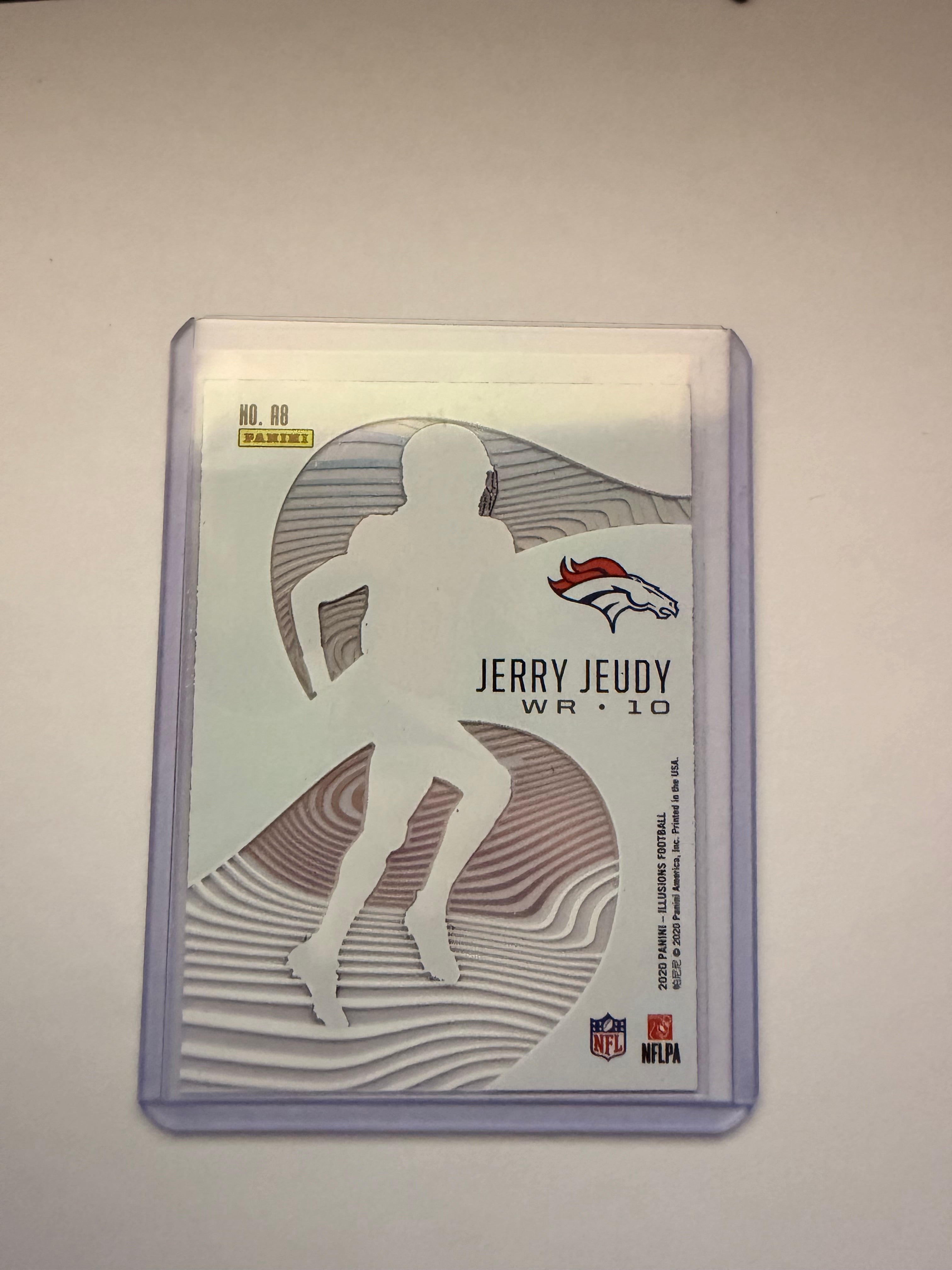 2023 Panini Illusions “Astounding” Jerry Jeudy Insert – Denver Broncos. Clean veteran WR insert.