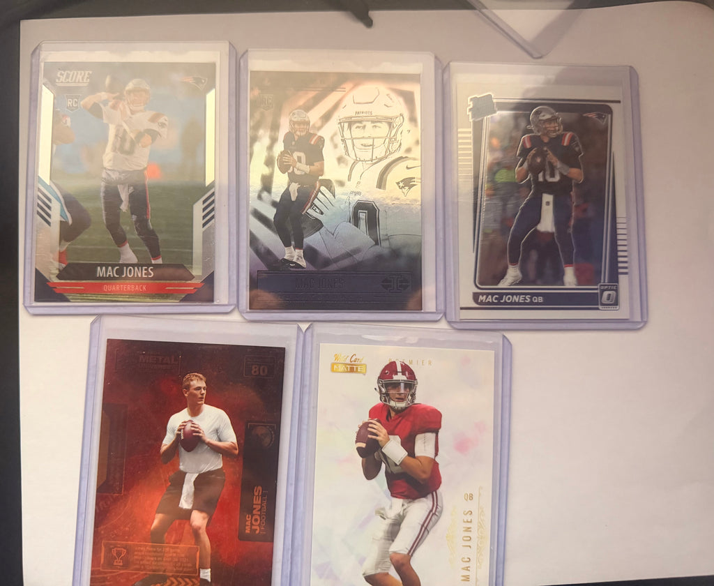 Mac Jones Rookie/Insert Lot – Score RC, Illusions, Donruss Optic Rated Rookie, Wild Card Matte, Metal Universe Champions (5-card mix).