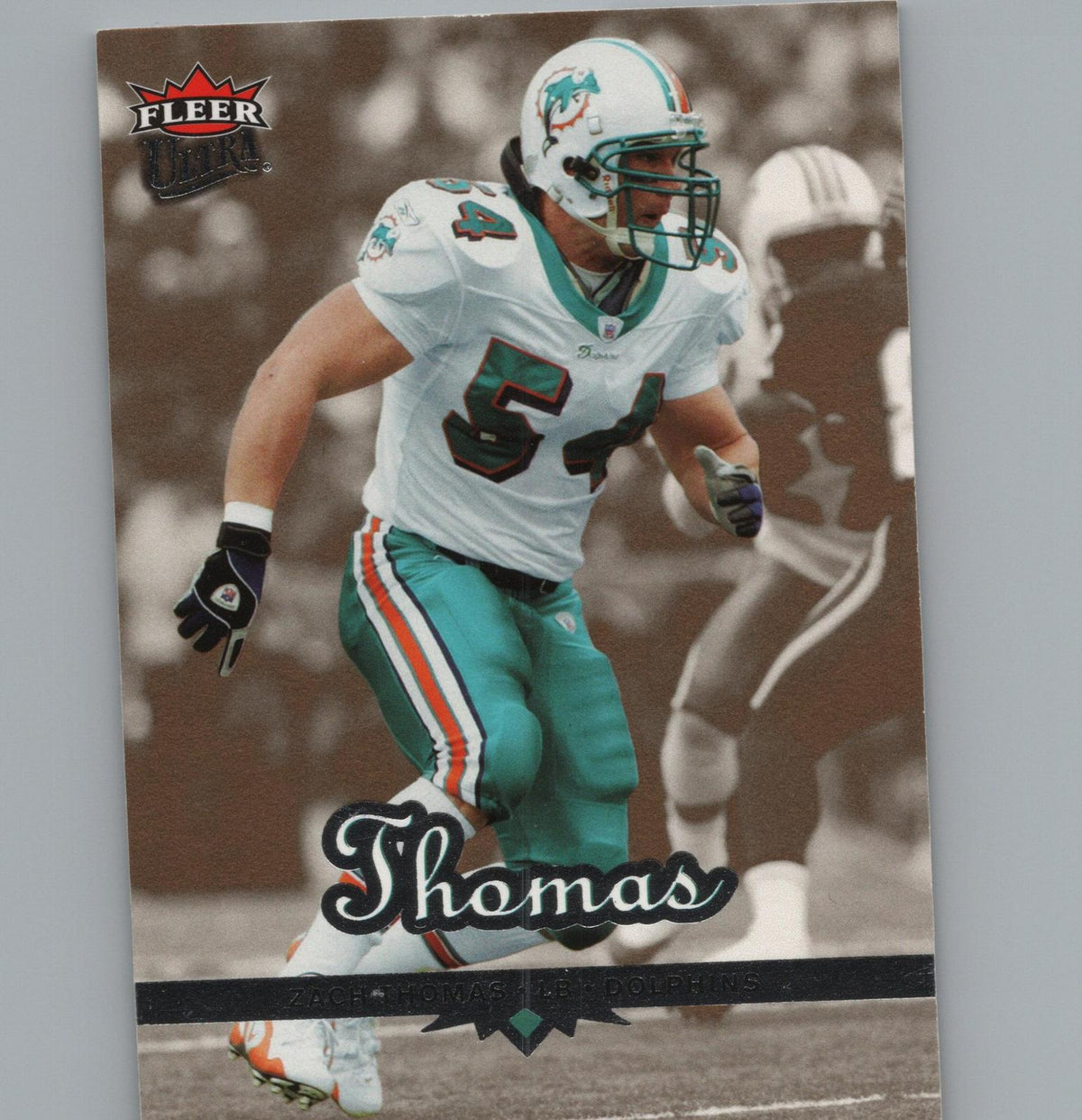 2006 Ultra #106 Zach Thomas Gold Medallion
