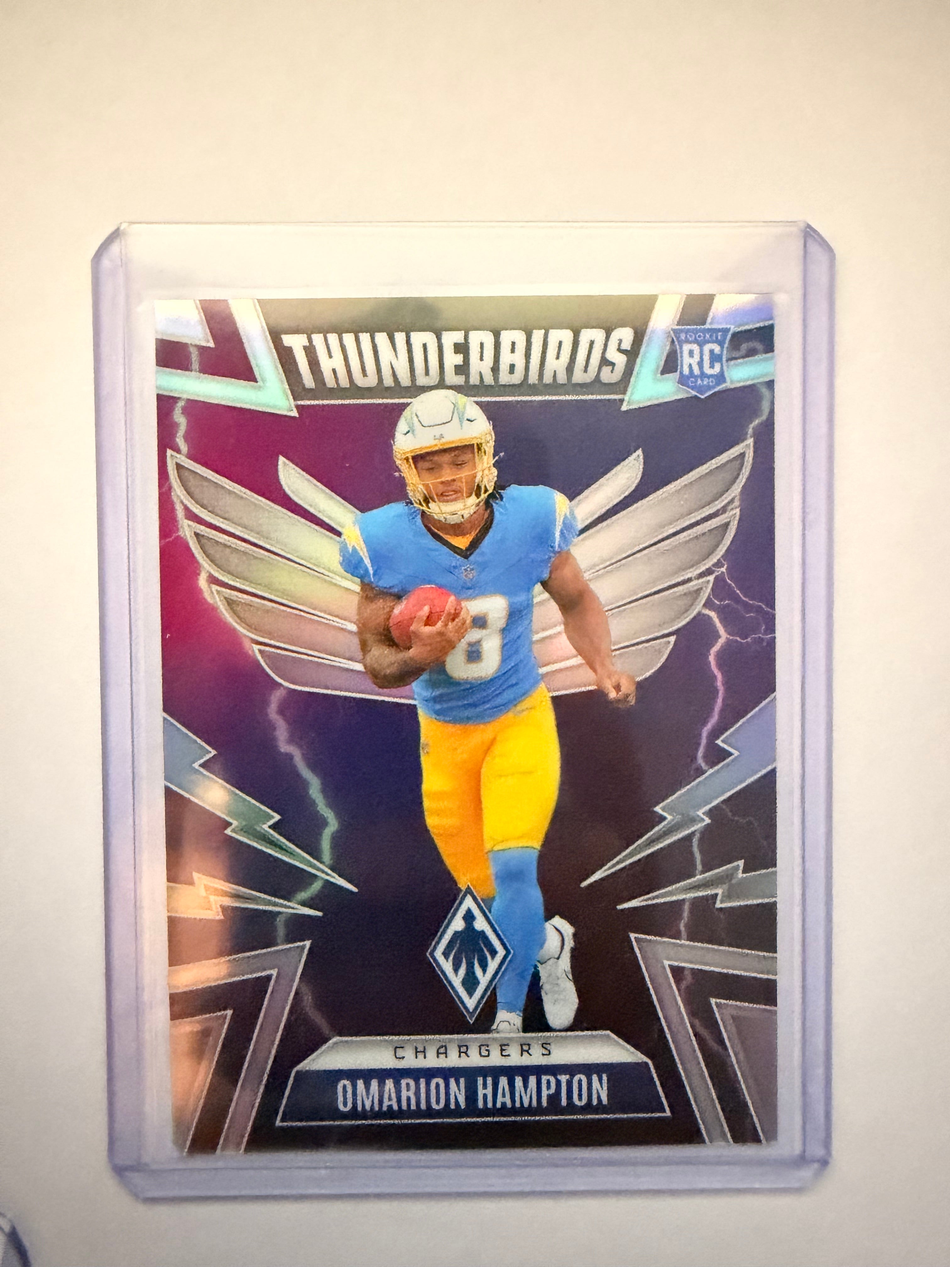2025 Panini Phoenix “Thunderbirds” Omarion Hampton RC – Los Angeles Chargers. Flashy rookie insert.