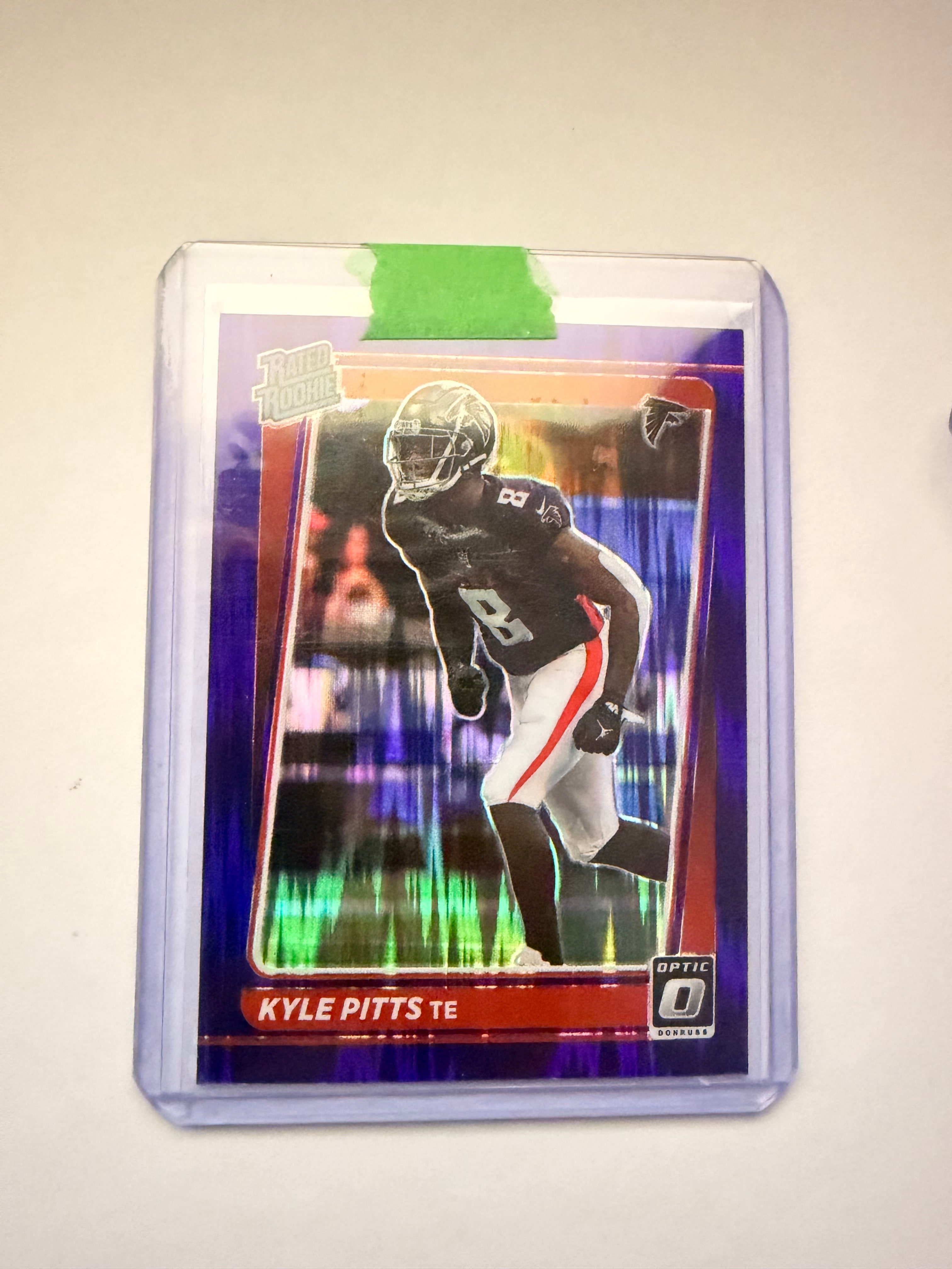 Kyle Pitts 2021 Donruss Optic Rated Rookie Purple Prizm – Atlanta Falcons. Rookie parallel with strong TE upside.