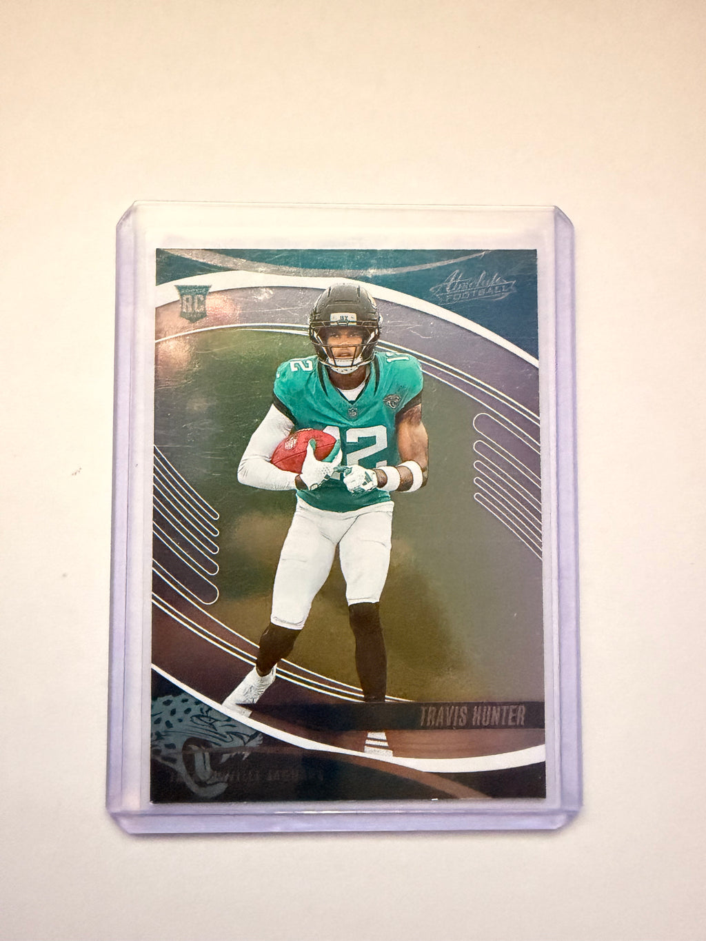 2025 Panini Absolute Travis Hunter #186 – Jacksonville Jaguars rookie card. Clean raw copy of the dynamic two-way star.