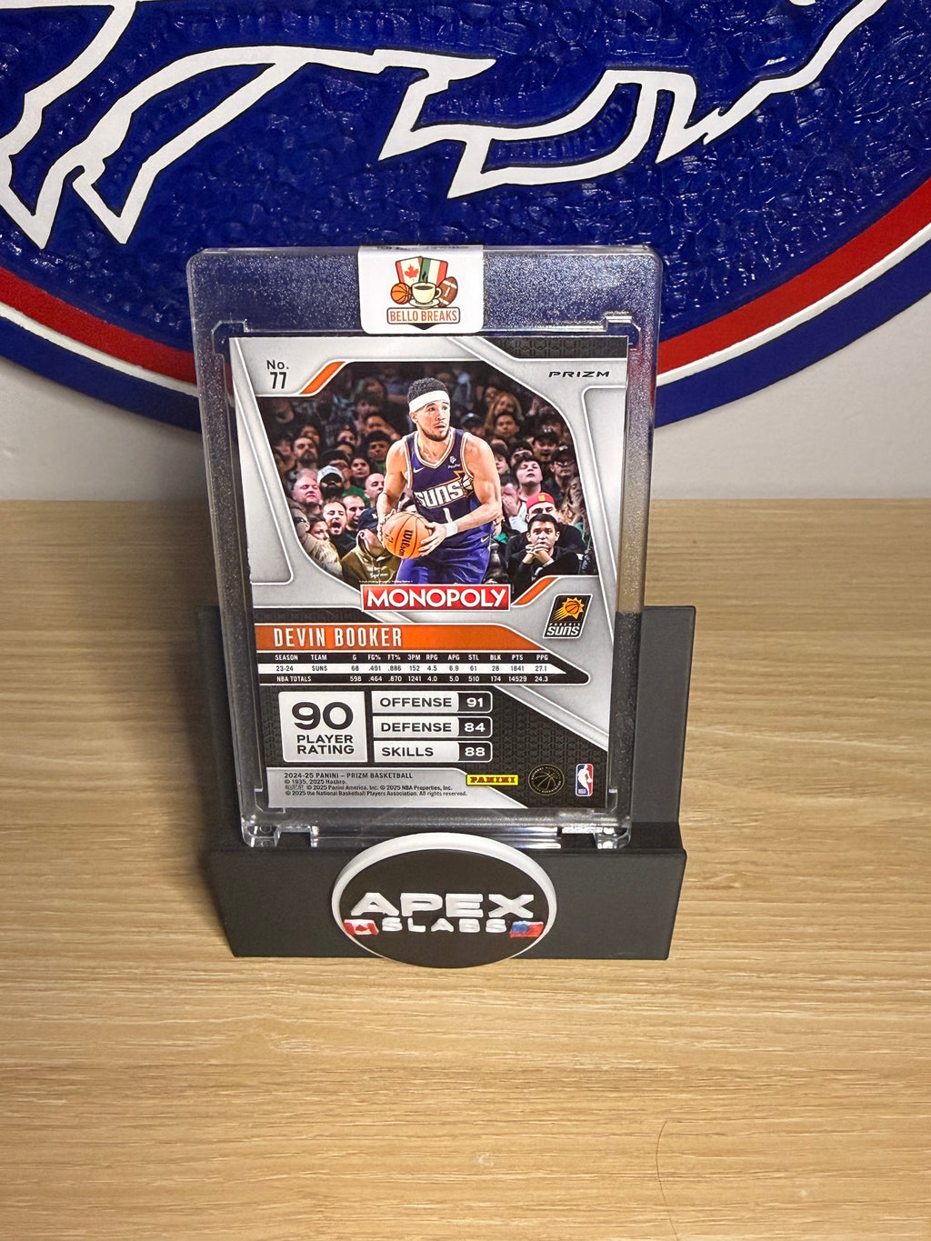 Devin Booker 2024-25 Panini Prizm Monopoly Red Prizm #77