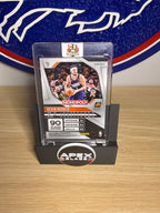 Devin Booker 2024-25 Panini Prizm Monopoly Red Prizm #77