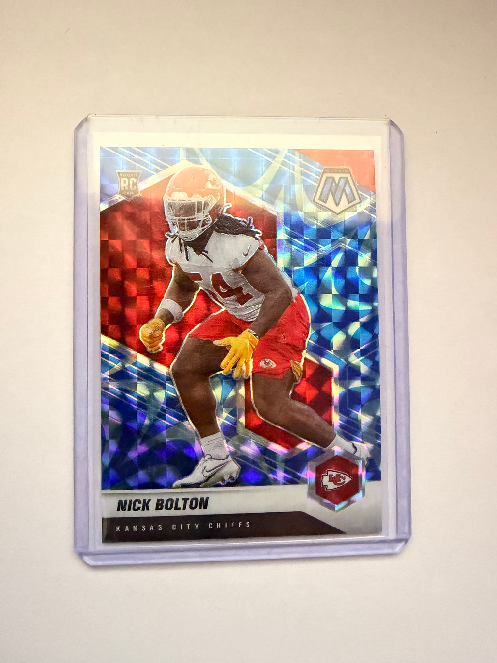 Nick Bolton 2021 Mosaic Silver Prizm – Kansas City Chiefs. Super Bowl linebacker silver parallel.